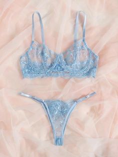 This blue lace lingerie set is perfect for any special occasion. Featuring exquisite detailing and a classic design, it is sure to turn heads. The lingerie set is crafted from premium-grade lace fabric for a luxurious feel and is designed for maximum comfort. Blue Lingerie, Rose Embroidery, Bra Types, Lace Lingerie Set, Sheer Fabrics, Lingerie Lace, Blue Lace, Lace Fabric, Lingerie Set