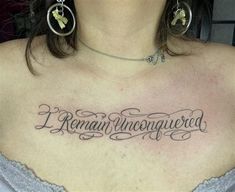 a woman with a tattoo on her chest that says, i remain unconditionaled