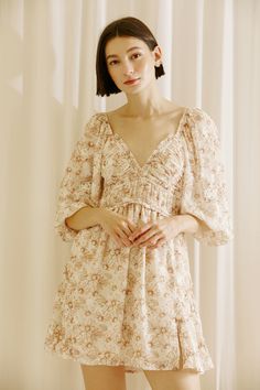 Renee Beige and Brown Daisy Print Mini Dress Front Wedding Jumpsuit, Print Mini Dress, Daisy Print, Puffy Sleeves, Brown Floral, Fabric Details, Beige Brown, Printed Mini Dress, Floral Fabric