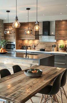 a wooden table sitting in the middle of a kitchen