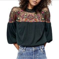 Free People Smocked Mock Neck; Back Button Closure With Keyhole Opening Machine Washable Shell: Cotton/Linen; Mesh: Nylon; Embroidery: Polyester Imported Nwot. Label Marked To Prevent Store Returns Embroidered Green Blouse For Fall, Casual Embroidered Fall Blouse, Black Tops With Embroidered Sleeves For Fall, Green Floral Embroidered Tops For Fall, Green Floral Embroidery Tops For Fall, Black Long Sleeve Top With Geometric Embroidery, Green Blouse With Embroidered Sleeves For Spring, Fall Blouse With Geometric Embroidery, Casual Floral Embroidered Top For Fall