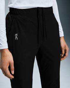 Lightweight and stretchy, these pants are dedicated to enhancing the joy of running. Made to move with you. Any direction. Any rhythm. The Core Pants move with you, thanks to an elastic waistband, gusset insert and pre-shaped knee construction. Plus, a hem that zips up to the knee makes changing into your gear a breeze. Engineered for 100% focus. No distractions. Just the run. A drawcord at the waist ensures a secure fit. And two side pockets mean you can keep essentials to hand. The lightweight Long Runs, Running Accessories, Travel Shoes, Running Pants, Running Gear, Tennis Clothes, Lifestyle Clothing, Road Running, Running Clothes