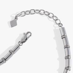 Lend your look a modern edge with the Tube Bead and Crystal Chain Bracelet. Crafted to be worn every day, this stainless steel bracelet is water, scratch and tarnish-resistant, so you can feel confident when you wear it on repeat. Gunmetal Jewelry With Lobster Clasp In Metal, Adjustable Stainless Steel Beaded Bangle Bracelets, Everyday Metal Beaded Bangle Bracelet, Adjustable Stainless Steel Beaded Bracelet, Adjustable Stainless Steel Beaded Bangle, Adjustable Stainless Steel Jubilee Charm Bracelet, Adjustable Gunmetal Jewelry With Chain, Stainless Steel Bracelet With Adjustable Chain, Modern Gunmetal Jewelry With Bracelet Strap