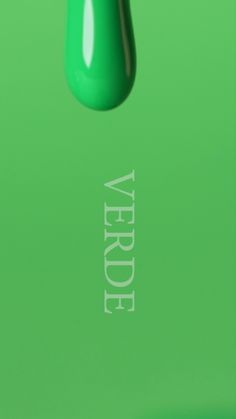 a green liquid drop with the word vadere in white writing on it and an image of a red apple