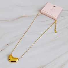 This Bold Molten Heart Necklace is as stylish as it is eye-catching. Featuring an impressive dimensionally rounded heart pendant hung on a round herringbone chain, it is sure to make any outfit stand out. 18k gold plated stainless steel, water and tarnish resistant Dimensions: approximately 16" with a 2" extender, heart pendant approximately 1.2" x 0.6" Lead and Nickel free Made in China Herringbone Chain, Everyday Gifts, Hair Setting, Gold Heart Necklace, Silver Heart Necklace, Scrunchie Hairstyles, Steel Jewelry, Stainless Steel Jewelry, Hair Accessories Headbands