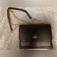 Coach Leather Purse With Gold Chain Strap. Strap Has A 22” In. Drop Can Be Worn Short Or Long.. Crossbody Or Shoulder Bag. Has Lots Of Space, Love This Bag But Never Use It (She’s Too Pretty To Be In My Closet!) Coach Luxury Shoulder Bag With Chain Strap, Luxury Coach Shoulder Bag With Chain Strap, Chic Coach Shoulder Bag With Chain Strap, Coach Rectangular Shoulder Bag With Chain Strap, Coach Crossbody Bag With Chain Strap, Coach Evening Bags With Chain Strap, Chic Coach Bags With Chain Strap, Coach Clutch Bag With Chain Strap, Designer Coach Shoulder Bag With Chain Strap