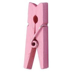 a pair of pink scissors sitting on top of each other