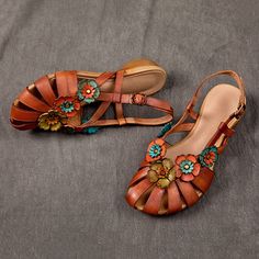 Description Walk into any room in these stylish and versatile leather sandals, adorned with exquisite floral accents and an ethnic style. An ideal companion for any occasion, these luxury sandals are sure to make an unforgettable impression! Details Gender: WomenItem Type: ShoesUpper Material: LeatherToe Type: Round ToeHeel Type: FlatHeel Height: Low Heel ( 1-3 cm)Theme: SummerOccasion: Daily, Casual, HolidayStyle: Casual Size Chart Size Length 35 8.86" (22.50 cm) 36 9.06" (23.00 cm) 37 9.25" (2 Vintage Leather Sandals With Flat Heel, Vintage Open Toe T-strap Sandals For Summer, Vintage Brown Sandals For Summer, Vintage Flat Sandals For Spring, Brown Toe Post T-strap Sandals For Spring, Vintage Leather Sandals For Spring, Bohemian T-strap Sandals With Ankle Strap, Brown Toe Ring Sandals For Spring, Elegant Brown T-strap Sandals For Beach