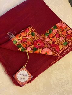 Multicoloured maroon embroidered pure pashmina shawl.  Multicolour shawl to pair with your beautiful dresses👗 Pure wool shawl. Embroidered kashmiri pashmina shawl. Beautiful winter accessory to pair with your statement dresses. Treat yourself with this beautiful shawl or gift it to your loved ones. 💝 Soft and warm beautiful winter shawl. Buy this for your self or give it to the ones you love ❤️  This item is dry clean only. Delivery 1-3 working days to UK 3-5 working days to Europe  And 6-7 wo Brown Embroidered Pashmina Shawl, Embroidered Red Pashmina Shawl In Jamawar, Red Jamawar Pashmina Shawl, Red Jamawar Shawl Dupatta, Red Pashmina Dupatta With Resham Embroidery, Red Jamawar Shawl With Dupatta Detail, Traditional Red Pashmina Shawl, Embroidered Red Pashmina Shawl, Festive Red Pashmina Shawl With Resham Embroidery