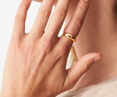 Design Sculptural and designed with comfort in mind, The Essential Dome Ring is a gorgeous curve of 14K gold that makes a statement on its own, or stacked with other favorites. Made to order; ships in 3-4 weeks. Materials 14K yellow or white gold plated Hypoallergenic; nickel, lead, and cadmium free Made entirely from recycled metals Made at 100% Carbon Neutral facility Made in the USA Size Band width undulates 3-7 mm (approx. .12”-.28")Depth undulates 2-6 mm (approx. .10”-.25”) Care Our jewelry Modern Gold Plated Dome Ring For Anniversary, Modern Adjustable Gold Dome Ring, Modern Gold Wide Band Ring For Everyday, Everyday Gold Wide Band Ring With Open Shape, Gold Dome Ring With Thick Band, Gold Dome Ring With Thick Band As Gift, Gold Dome Ring With Thick Band For Gift, Gold Wide Band Ring Tarnish Resistant For Everyday, Modern Gold Dome Ring For Anniversary