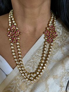 NEW ARRIVAL ♥️ Premium Quality  RESTOCKED! All our pieces are in stock and will be dispatched with in 24 to 48 hours of order. Orders received during the weekend will be dispatched on Monday.  A gorgeous Kundan jewelry piece for the gorgeous Indian bride Premium Bikaneri Kundan  You will definitely fall in love with the Kundan work crafted beautifully to make a stunning bridal piece.  Handmade by our skilled Indian craftsmen from Bikaner. One of our favorite picks for the wedding season ❤️ The statement bridal Kundan Earrings add to the royal look of the stunning necklace. The necklace comes with an adjustable string. The drop length of the necklace is 9 inches. Length of earrings: 4.5 cms Weight of earrings: 16 grams Material: Brass.Copper, silver mix, gold plating, Kundan stones, beads W Fusion Style Kundan Bridal Earrings For Wedding, Fusion Kundan Bridal Earrings For Weddings, Fusion Style Bridal Earrings With Tilla For Wedding, Hand Set Chandbali Bridal Necklace For Wedding, Fusion Style Hand Set Bridal Sets For Wedding, Fusion Bridal Sets Hand Set For Wedding, Intricate Bridal Necklace For Wedding, Fusion Style Wedding Bridal Sets, Fusion Style Kundan Necklace For Weddings