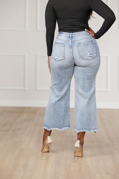 This item is Final Sale. No refunds or exchanges will be honored. Step into style with our Gianna Frayed Hem Wide Jeans! These high waisted jeans feature a wide leg for a flattering fit and a frayed hem for a touch of edginess. Whether it's day or night, these ankle length jeans are perfect for any occasion. Elevate your wardrobe with these versatile statement jeans! Description: High rise. Ankle length. Wide leg, lightly distressed, unfinished hem Stretchy light wash denim - 92% cotton, 6% poly Statement Jeans, Ankle Length Jeans, Skirt Jumpsuit, Wide Jeans, High Waisted Jeans, Light Wash Denim, Womens Casual, Womens Casual Outfits, New Arrival Dress