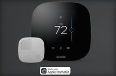 an ecobee smart thermostaer and appliance on a dark background