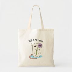 a tote bag with a cat holding a flower in it's mouth and saying have a nice day