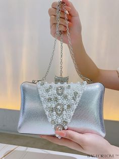 BagForLove - Chic Wedding & Party Clutch: Elegant Faux Pearl & Rhinestone Embellished Accessory Product Description Color Silver Bag Size Mini Pattern Type Plain Type Box Bag Material Iron Size Chart INCH CM Bag Height Bag Length Bag Width 5.5 inch 7.9 inch 2.6 inch Bag Height Bag Length Bag Width 14 cm 20 cm 6.5 cm Details Pictures Similar Products h2 { text-align: center; } /* æ¢è¡ */ li{ white-space: normal; word-break: break-all; word-wrap: break-word; } .red-box { width: 100%; display: fl Chic Wedding Party, Silver Bags, Party Clutch, Gold Bag, Rhinestone Embellishments, Word Wrap, Evening Clutch Bag, Box Bag, Evening Clutch