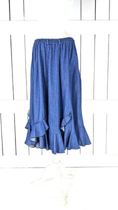 "Vintage blue ruffle flowy long denim jean skirt Measurements...taken flat -marked size: no label -across waist: 15\"-20\" -length: 33\" Features... -medium weight cotton denim -cool ruffle tiered detail -stretch waist -lovely drape and flow -unlined Condition: -excellent vintage condition -gently worn" Fitted Flare Denim Skirt For Summer, Summer Denim Blue Flowy Skirt, Flowy Denim Blue Skirt For Summer, Flowy Wide-leg Bottoms With Ruffles, Spring Flared Cotton Skirt, Summer Denim Maxi Skirt In Dark Wash, Summer Dark Wash Denim Maxi Skirt, Spring Long Denim Skirt With Frayed Hem, Summer Medium Wash Tiered Skirt