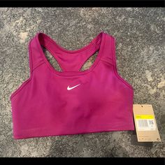 Nwt Nike Sports Bra- Medium Support With Built In Cups. Runs Small (I’m Generally A 34b And This Is Tighter Than I Like) Color Is Between A Purple And Pink. Purple Moisture-wicking Sleeveless Sports Bra, Purple Moisture-wicking Sports Bra, Sporty Purple Running Tops, Purple Racerback Sports Bra For Workout, Fitted Purple Racerback Activewear, Purple Racerback Activewear For Sports, Purple Racerback Sports Bra, Purple Fitted Sports Bra For Training, Fitted Purple Sports Bra For Gym