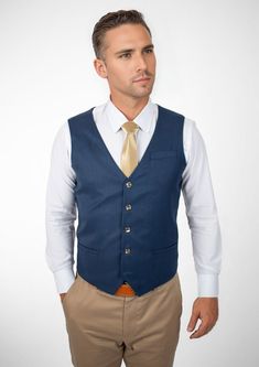 Experience classic styling and modern finesse wearing the Prussian Blue Pinstripe vest. Featuring a vibrant blue hue with subtle pinstripes, this custom made vest will make you feel vibrant and confident. Classic Navy Sleeveless Vest, Classic Fitted Navy Vest, Classic Navy Fitted Vest, Navy Fitted Classic Vest, Classic Pinstripe Formal Vest, Classic Pinstripe Vest For Formal Occasions, Navy Fitted Elegant Vest, Elegant Fitted Navy Vest, Elegant Blue Vest