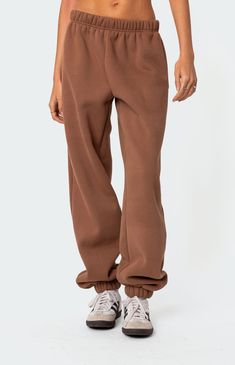 Online Only! Dive into ultimate coziness with Edikted's Clark Oversized Sweatpants. Stay on-trend with the perfect blend of comfort and style, featuring an elastic stretch waistline, oversized fit, elasticated hem, and convenient side pockets. Elevate your loungewear game and achieve maximum comfort without compromising on fashion with these must-have oversized sweatpants.   	Elastic stretch waistline 	Side pockets 	Oversized fit 	Cotton, Polyester 	Model wears size S 	Model height is 5'9 Sweatpants Oversized, Oversized Sweatpants, Visionary Fashion, Womens Clarks, Womens Loungewear, Womens Sweatpants, S Models, Model Height, Pacsun