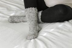 "Stay cozy in the cold weather with these hand knit Cottage Socks! These warm socks feature thick wool/acrylic blend yarn. Choose from over 30 colors! The sizing in the drop-down menu shows US shoe sizes with their approximate measurement in inches. *Colors shown in photos: Gray Marble, Pumpkin* Processing Time: This item is Made To Order and takes approximately 1 to 2 weeks to complete before it will be shipped to you. If you require a Rush Order, please message me, and I will give you a new es Cozy Chunky Knit Socks With Round Toe, Cozy Chunky Knit Socks, Cozy Knitted Snug Socks, Cozy Warm Socks For Cold Weather, Cozy Snug Socks For Cold Weather, Cozy Knitted Socks For Winter, Comfortable Knitted Gray Socks, Cozy Knitted Winter Socks, Cozy Knitted Socks