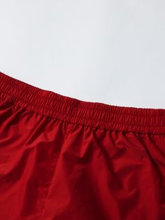 Details: Rich Chelsea red spliced with mysterious navy blue shorts. Multi-colour block splicing collision, create American retro sports style. Loose small A-line fit Elasticated waistband design Back pockets in khaki colour blocking Materials & Care: Fabric 1: polyester 100%;fabric 2: nylon 100%Lining: polyester 90.2 % Spandex 9.8% Hand wash | Dry clean Do not bleach Size & Fit: Model is 5'7", Bust 32, Waist 24, Hips 35, wearing a size S Item #: JN1PA20 Stretch Red Color Block Bottoms, Casual Sports Shorts With Contrast Color, Stretch Color Block Short Bottoms, Stretch Color Block Bottoms, Short Shape, Stretch Color Block Bottoms In Short Shape, Sporty Shorts With Contrast Color, Red Color Block Sports Bottoms, Red Nylon Bottoms Of Short Length, Red Nylon Shorts