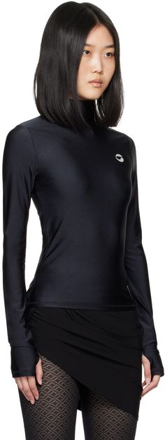 Stretch nylon jersey T-shirt. · Mock neck · Logo bonded at chest Supplier color: Black Fitted Turtleneck Top For Sports, High Neck Athleisure Top, Black High Stretch Funnel Neck Top, High Neck Sports Top, Black High Neck Tops For Sports, High Neck Black Tops For Sports, Black High Neck Athleisure Top, Fitted Funnel Neck Athleisure Top, Black Funnel Neck Top In Elastane