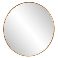 a round mirror with gold rim