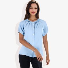 The Anna-Kaci Women's Short Sleeve Button Down Blouse with Gathered Neckline is a perfect addition to your everyday wardrobe. Crafted from soft, breathable fabric, this blouse features a gathered neckline and a button-down front that combine comfort with a touch of elegance. The short sleeves ensure a relaxed fit, making it ideal for warm weather or layering under a jacket. Whether you're running errands, enjoying a casual day out, or heading to a lunch date, this versatile blouse pairs effortle Light Blue Buttoned Tops For Work, Light Blue Buttoned Blouse For Work, Light Blue Short Sleeve Blouse With Buttons, Light Blue Button Closure Top For Work, Light Blue Workwear Top With Button Closure, Light Blue Top With Button Closure For Work, Light Blue Short Sleeve Button Blouse, Light Blue Button Blouse For Work, Light Blue Button-up Blouse For Day Out