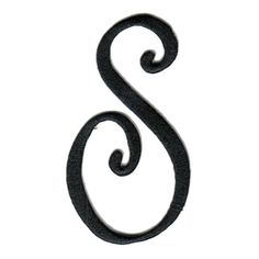 the letter s is made up of black metal and has swirly designs on it