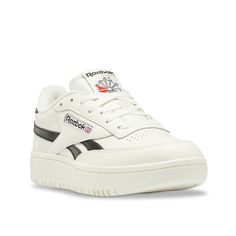 Reebok-Club C Double Sneaker - Women's Add some flair to your athleisure vibe with the Club C Double sneaker from Reebok. This court-themed silhouette features a retro-inspired style that makes it a classic addition to your collection of casual kicks. Complete with trendy touches, including sporty stripes along the side and a perforated detail on the toe. Black Women Sneakers, Reebok Club C Double Sneaker, Sneakers Women Outfit, Jordan Woman, High Sneakers Women, Reebok Club C Double, College Vibes, Casual White Sneakers, Nmd Sneakers