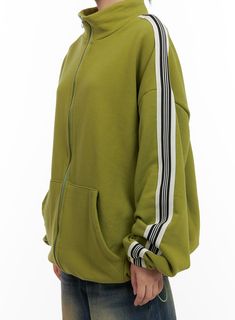 Product Detail Style : Street, Acubi Occasion : Back to school Type : Sweat, Activewear Detail : Zip up Sleeve : Long sleeve Fit : Oversize fit undefined Model Size Model is wearing size S/M and the color Light green. Height : 5'5" | 166cm / Top : S / Bottom : S (25 inch) .prddescription table, .prddescription td, .prddescription th { border : 1px solid black; border-collapse : collapse; padding: 10px; } Size(Inch) Size Shoulder Bust Sleeve Length Armhole Sleeve Width Sleeve Hem Hem Total Length Oversized Long Sleeve Hoodie For College, Oversized Winter College Sweatshirt, Casual Long Sleeve Track Jacket For Streetwear, Sporty Cotton Outerwear For School, Sporty Outerwear With Ribbed Cuffs For School, Oversized Long Sleeve Hoodie For School, Trendy Track Jacket With Ribbed Cuffs And Long Sleeves, Trendy Long Sleeve Track Jacket With Ribbed Cuffs, Oversized Green Sporty Hoodie