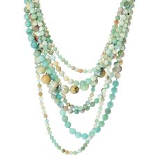 This vibrant Kenneth Jay Lane necklace features seven strands of beautifully handcrafted amazonite beads in varying shades of blue, green and brown. The harmonious blend of colors creates a stunning and eye-catching piece that complements a wide range of outfits. Each bead is made from genuine amazonite, which is believed by many to have soothing and calming properties. The multi-strand design adds volume and dimension, making it a statement piece that instantly elevates any ensemble. Green Multi-strand Hand-strung Necklaces, Polished Amazonite Round Bead Necklaces, Green Multi-strand Hand-strung Beaded Necklaces, Amazonite Polished Round Bead Necklaces, Green Multi-strand Beaded Necklace With Natural Stones, Green Single Strand Beaded Necklace In Amazonite, Green Amazonite Single Strand Beaded Necklace, Elegant Amazonite Beaded Necklaces With Natural Stones, Green Amazonite Round Beads Necklaces