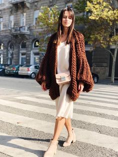 This brown maxi coat  is warm, oversize and very popular among our customers. Chunky knit sweater for women.This crochet cardigan is long and has long sleeves. This elegant, soft and warm chunky cardigan is made of wool blend yarn. Wool cardigan open in front, loose fit. The coat is very practical.The front of the coat is open, so if you want, you can close on special buttons.The knitted cardigan is comfortably light, very soft and super cozy. Since the material is very high quality wool yarn  t Trendy Hand Knitted Outerwear For Fall, Oversized Knitted Outerwear, Cozy Knit Cardigan With Batwing Sleeves, Trendy Oversized Knitted Outerwear, Oversized Open Front Knit Cardigan, Oversized Knit Open Front Cardigan, Casual Oversized Hand Knitted Outerwear, Oversized Knitted Trendy Cardigan, Brown Knit Casual Cardigan