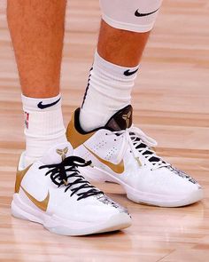 a close up view of the shoes worn by golden state warriors basketball players during a game