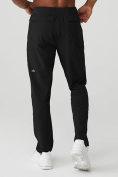 We’re redefining all-day performance wear with the Repetition Pant. This tailored and ultra-comfy pant is elevated in every way with darting details that define the knee and internal draw cords for a sleek overall finish. Pair it with a favorite crew neck for a head-to-toe statement Alo look. Easy styling with sleek features Performance engineered Ideal for studio & street Designed & uniquely fit for every size Wear-tested by our in-house team for the perfect fit Functional 4-way Stretch Alo Yoga Bottoms, Alo Yoga 4-way Stretch Athleisure Bottoms, Sporty Alo Yoga Workout Pants, Functional Moisture-wicking Alo Yoga Bottoms, Moisture-wicking Functional Alo Yoga Bottoms, Alo Yoga Athleisure Running Bottoms, Alo Yoga Full Length Sports Pants, Alo Yoga Athleisure Bottoms For Running, Alo Yoga Moisture-wicking Functional Bottoms