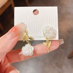 Description:Chic Resin White Flower Earrings Specifications: Material: Alloy Metal, Resin, 18k GoldColors: goldSize: 3.2 cm * 1.6 cmWeight: 7.2 g/pcs Add a touch of whimsy with these Chic Resin White Flower Earrings. These earrings are not your average pair - they feature delicate white resin flowers that will make you bloom with confidence. Perfect for adding a playful touch to any outfit! 🌸 White Gold Plated Flower Earrings For Wedding, Rose Gold Plated Flower Earrings For Gift, Rose Gold Flower Earrings For Gift, Rose Gold Plated Flower Earrings As Gift, White Feminine Flower Earrings For Anniversary, Rose Gold Flower Earrings As Gift, Feminine White Flower Earrings For Anniversary, White Flower-shaped Gold Plated Jewelry, Rose Gold Flower Shaped Gold Plated Earrings