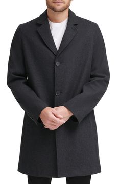 As temperatures began to drop, you'll need this topper constructed from wool blend fabric for essential style and warmth. 37" length (size M) Notch lapel Long sleeves Front button closure Wool blend construction Lined 60% wool, 30% polyester, 5% nylon, 5% other fibers shell; 100% polyester lining Dry clean Imported Model stats: 6'1" height, 32" waist. Model is wearing size M. Classic Charcoal Outerwear For Fall, Classic Fitted Charcoal Outerwear, Charcoal Wool Outerwear For Fall, Fitted Charcoal Outerwear For Winter, Elegant Charcoal Winter Outerwear, Charcoal Wool Outerwear For Work, Classic Gray Outerwear With Hidden Button Closure, Classic Gray Wool Coat, Classic Gray Pea Coat