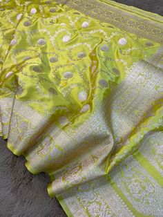 This is a very beautiful high quality mashru silk saree . All over zari motifs design with border . Saree length - 5.5 mtr. Blouse - 1 mtr. Dry clean only . Please note - color may be vary a little due to sunlight and photography . Please message us after purchasing in case you want fall and Pico done it not . No extra charges for fall and Pico but inform us . Blouse stitching is also available . Pista Green Banarasi Silk Pre-draped Saree For Eid, Pista Green Silk Dupatta For Diwali, Elegant Yellow Art Silk Dupatta, Pista Green Silk Saree With Zari Work, Yellow Banarasi Silk Salwar Kameez With Traditional Drape, Yellow Banarasi Silk Salwar Kameez, Pista Green Embroidered Saree For Festivals, Pista Green Saree With Dupatta For Puja, Elegant Yellow Banarasi Silk Lehenga