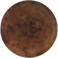 a round metal plate with rusted paint on it