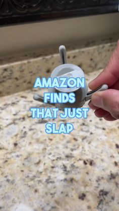 someone holding scissors in their hand with the words amazon finds that just slap