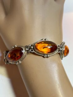 Baltic Amber Sterling Bracelet 8.5" Honey Cognac Polish Poland 925 Silver Vintage Jewelry Southwestern Anniversary Christmas Birthday Gift https://www.etsy.com/listing/1568916916/baltic-amber-sterling-bracelet-85-honey Antique Sterling Silver Bracelet Nickel-free Gift, Vintage Amber Jewelry With Polished Finish, Vintage Brown Jewelry With Polished Finish, Victorian Bracelets With Polished Finish As Gift, Victorian Bracelets With Polished Finish, Victorian Bracelet With Polished Finish As Gift, Vintage Sterling Silver Bracelet Stamped 925, Victorian Polished Finish Bracelet Gift, Vintage Brown Hallmarked Jewelry