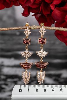 Wedding burgundy earrings Burgundy stud earrings bride Vintage earrings Crystal earrings Boho bridal earrings Wedding bridal earrings 1920s Cute earrings for your special occasion with crystal and small cubic zirconia on the hook and inside the leaves for sparkle. Be irresistible on your special occasion. Metal: Brass, Gold If you want to change the colors of the pendant or change the design to your liking, just contact me and together we will create a masterpiece WITH YOUR HANDS. Follow the link below to see more jewelry for your special day. https://niceolhajewelry.etsy.com ◆ Delivery ◆America takes 5-9 days after dispatch. ◆ Sweden 9-10 days after dispatch. ◆All items on my website are in stock. Order processing takes 1-3 days from the date of order. ◆Delivery within Germany 3-4 days af Autumn Color Season, Burgundy Earrings, Wedding Burgundy, Bride Vintage, Earrings Bride, Be Irresistible, Bracelet Tennis, Deco Earrings, Bride Earrings