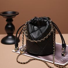 Free U.S. shipping. Style:  , color:Black, suite for season：Spring, Summer, Autumn ，Going out, Hanging out, Travel, Work, Material Genuine Leather, Black Leather Quiled Bag Drawstring Bucket Handbags With Chain Strap Luxury Black Bucket Bag With Chain Strap, Black Bucket Bag With Chain Strap, Black Fall Bucket Bag, Black Bag With Dust Bag Included For Fall, Black Bucket Shoulder Bag With Chain Strap, Black Shoulder Bucket Bag Gift, Black Bucket Bag With Mobile Phone Pocket For Evening, Evening Black Bucket Bag With Mobile Phone Holder, Black Shoulder Bag For Fall Party