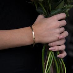 A beautiful solid 9ct gold bangle, textured with the signature Storybook finish both inside and out.The Storybook texture reflects the tactile quality of leather bound books from Alison's childhood and it is finished with a gorgeous flowing edge reminiscent of well thumbed pages of those books.The gold bangle gently flows around your wrist and its natural feel and simple style make the bangle the perfect piece of jewellery.. A lovely, unique design which will be cherished for years to come.Each Modern Hammered Yellow Gold Bracelets, Elegant 14k Gold Hammered Bracelet, Anniversary Hammered Yellow Gold Bracelets, Elegant Hammered Yellow Gold Bracelet, Hammered 14k Gold Bracelet For Gift, 14k Gold Hammered Bracelet Gift, Hammered 14k Gold Bracelets Gift, Hammered 14k Gold Bangle Gift, Hammered Yellow Gold Bracelets Gift