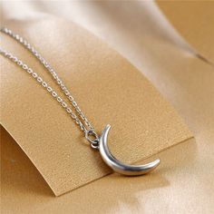 Crescent Moon Necklace-Ringified Jewelry Minimalist Moon Shape Charm Necklace With Clavicle Chain, Celestial Silver Half Moon Necklace, Celestial Silver Crescent Necklace, Minimalist Moon Phase Pendant Necklace, Minimalist Half Moon Clavicle Chain Necklace, Trendy Round Jewelry With Moon Charm, Trendy Silver Jewelry With Moon Charm, Sterling Silver Crescent Clavicle Necklace, Sterling Silver Crescent Clavicle Chain Necklace