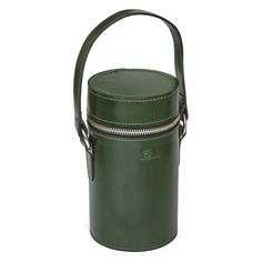 a green leather bucket with two zippers