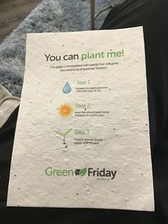 someone is holding up a green friday poster