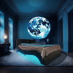 a bed in a room with a glowing moon on the wall