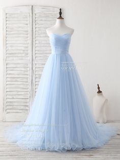 Blue A-line Tulle Evening Dress, Fitted Tulle Bridesmaid Dress, Blue Tulle Gown With Tulle Skirt, Blue Gown With Tulle Skirt And Fitted Bodice, Fitted Blue Ball Gown With Tulle Skirt, Blue Sweetheart Neckline Dress For Debutante Ball, Blue Tulle Dress For Prom Season, Blue Fitted Tulle Bridesmaid Dress, Light Blue Dress With Sweetheart Neckline For Prom Season