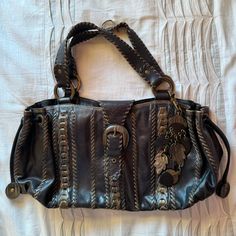 Isabella Fiore Hand Stitched Leather Bag, Dark Brown With Tan Stitching And Gold Detail, Buckle Detail, Wood Leaf Attachable Charms, Good Condition! Isabella Fiore Bag, Tvd Clothes, Witch Bag, Thrift List, Thrift Wishlist, Wood Leaf, Gothic Bag, Vintage Runway, Handbag Essentials